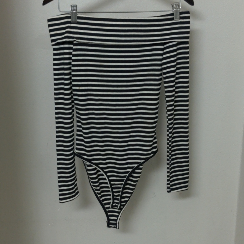 Shoulder resting onesie NEVER WORN!